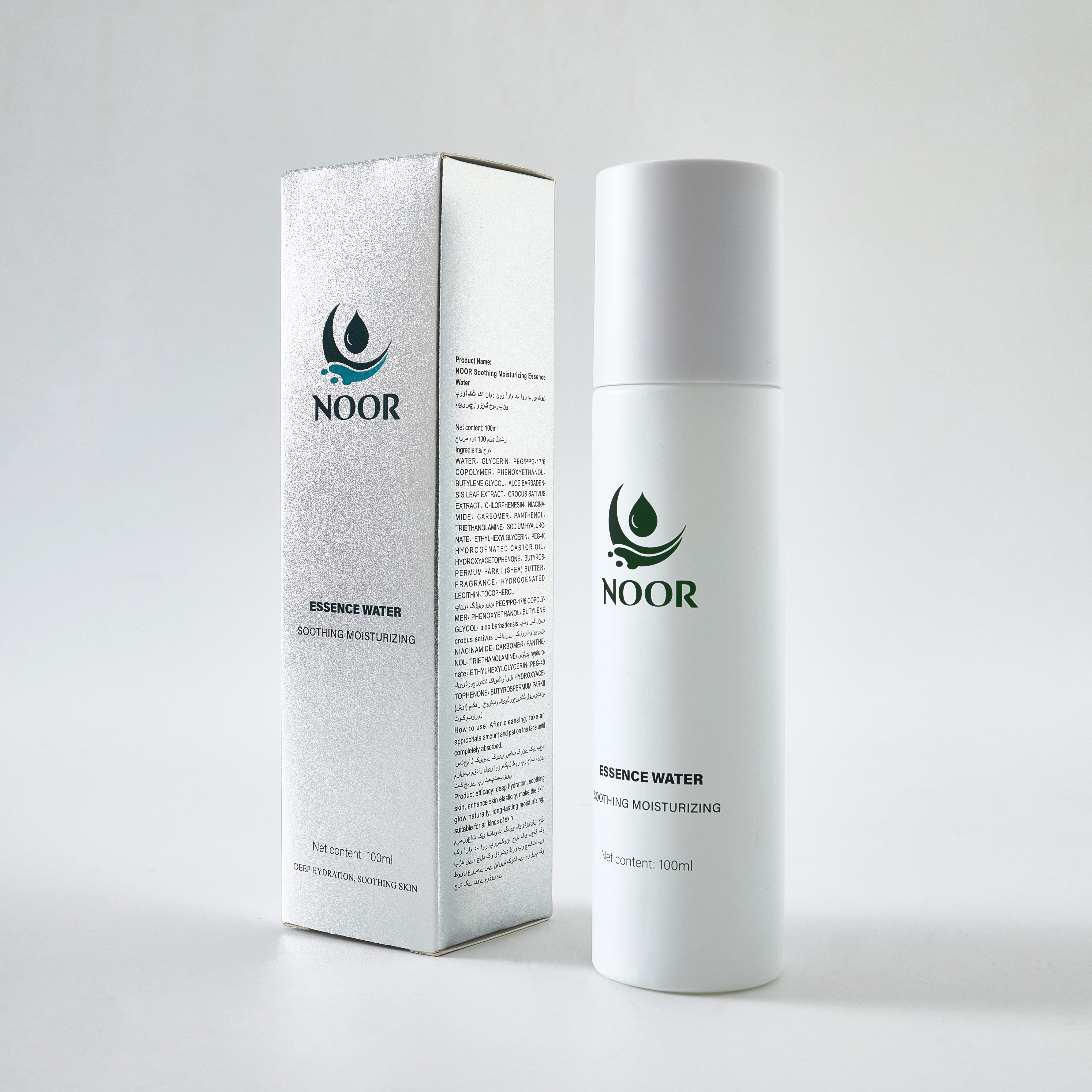 NOOR Essence Water and silver packaging in soft studio light